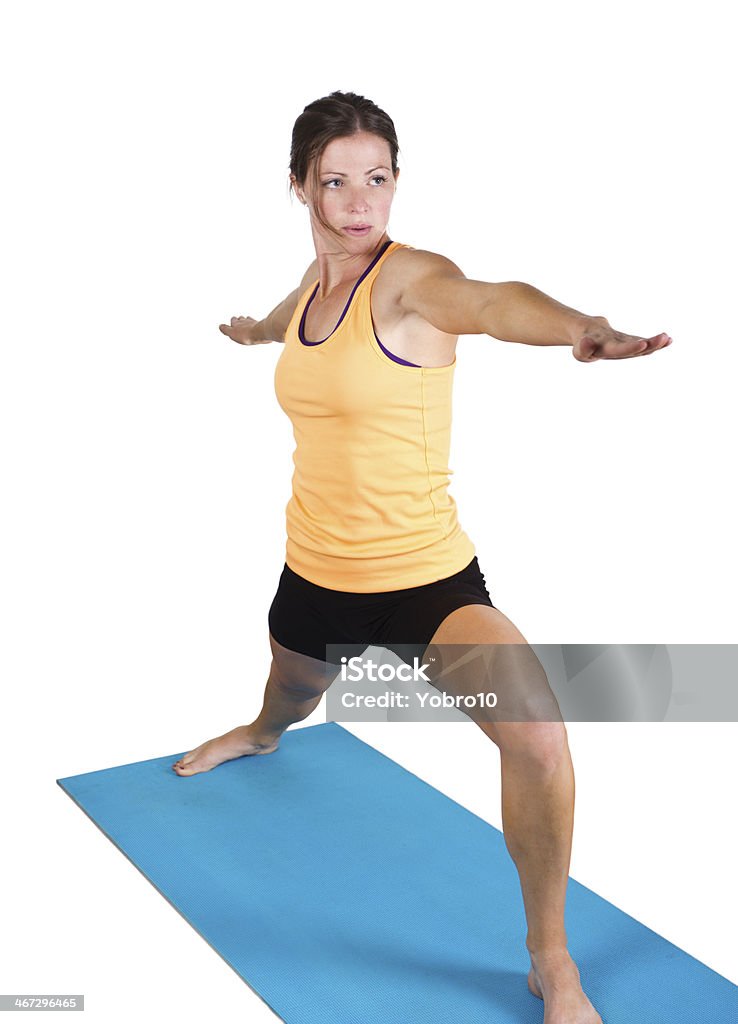 Vestibilità femmina lo stretching e di fare yoga - Foto stock royalty-free di Abbigliamento sportivo