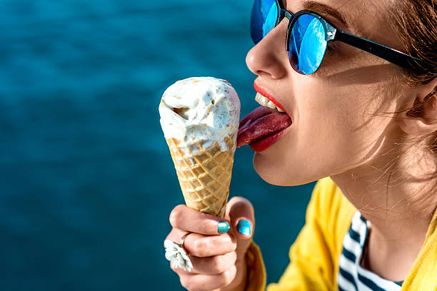 istock Woman with ice cream 467299596