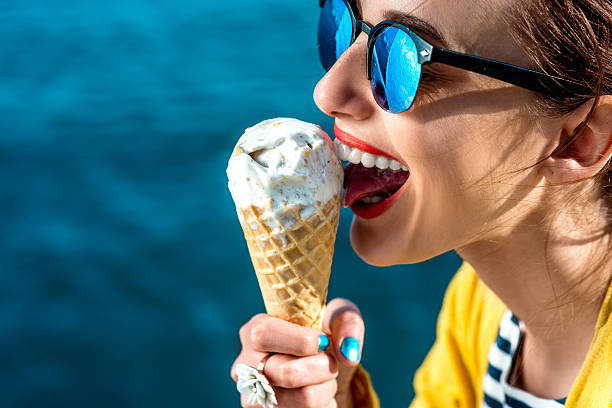 istock Woman with ice cream 467299644