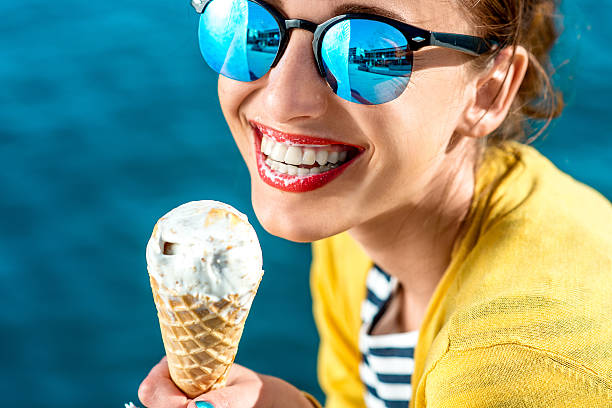 istock Woman with ice cream 467303278