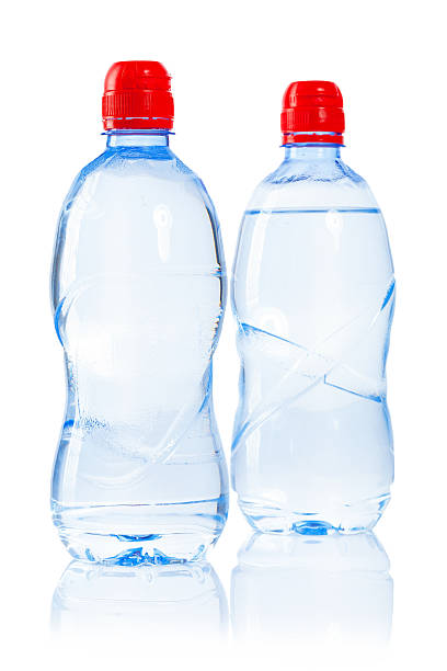 istock two isolated bottles of water 467307685