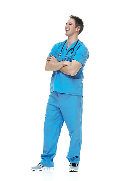 istock Smiling male nurse standing with arms crossed 467309743