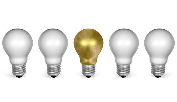 Golden light bulb in row of white ones. Front view