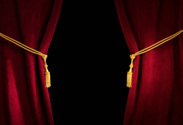 Red velvet curtain with tassel Red velvet curtain with tassel. Close up black isolated curtain velvet curtain stock pictures, royalty-free photos & images