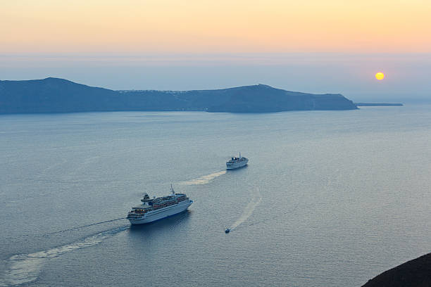 istock Sunset with cruise liners in Santorini island 467316707