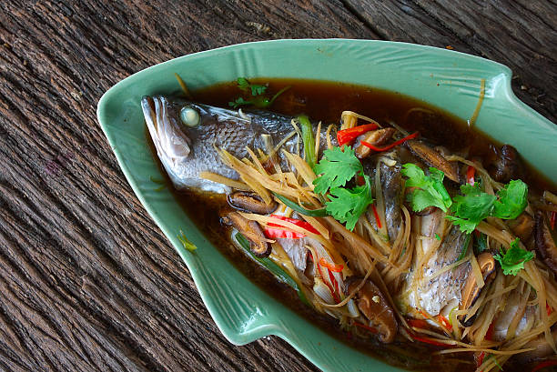 steamed snapper fish stock photo