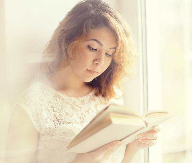 istock happy girl reading the morning 467319020