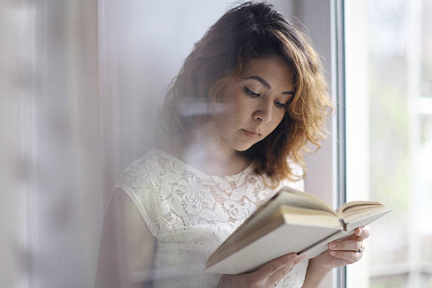 istock happy girl reading the morning 467319022