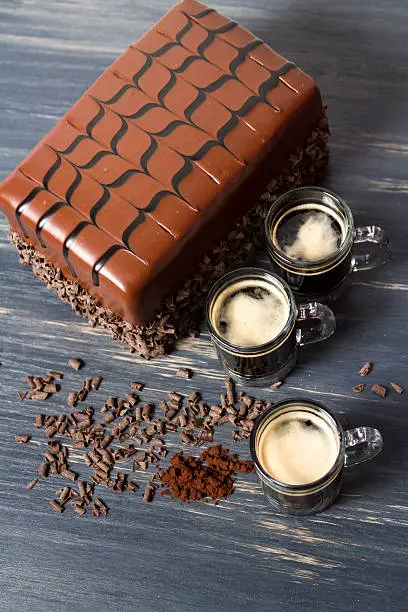 Lefthand brewery milk stout cake with  multiple layers of stout-infused chocolate cake, filled with stout chocolate mousse and covered in milk chocolate ganache.