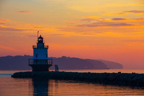 A gorgeous sunrise at Spring Point Lighthouse, South Portland, Maine, USA.