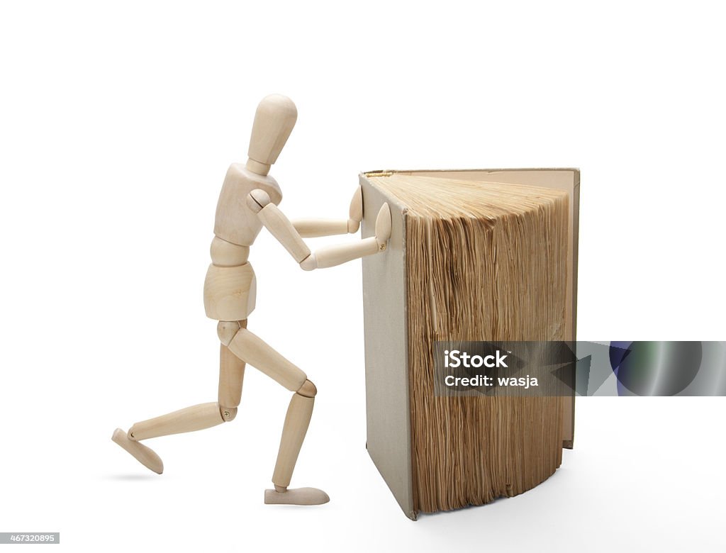 Uomo in legno e prenota - Foto stock royalty-free di Adulto