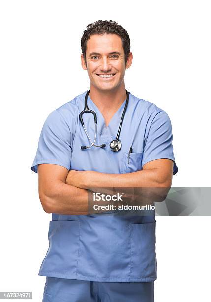 Confident Doctor Stock Photo - Download Image Now - Males, Medical Scrubs, White Background