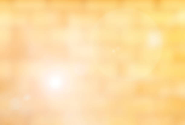 istock Blurred brick wall in orange yellow tone abstract with flare 467325750