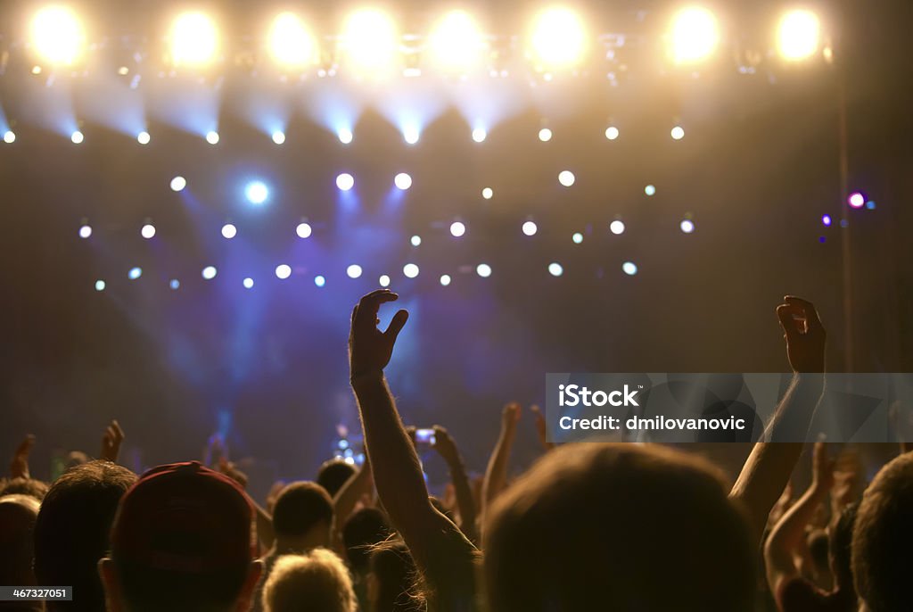 Concert crowd People dancing at the concert. Applauding Stock Photo