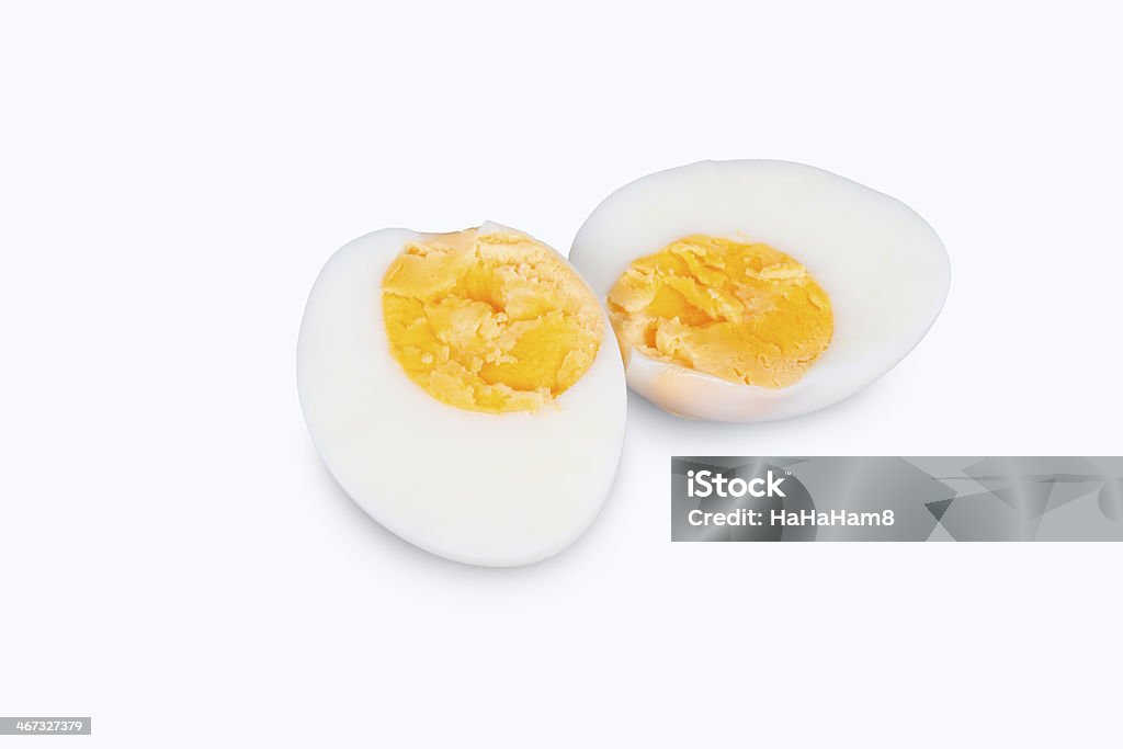 Hard boiled egg cut in half on white background Cooked egg isolated on white background Boiled Egg Stock Photo