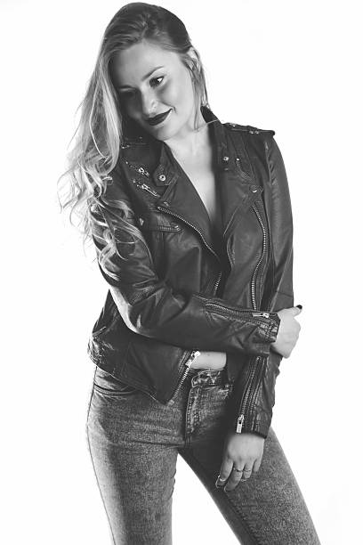 istock girl in lather jacket posing in studio 467327962
