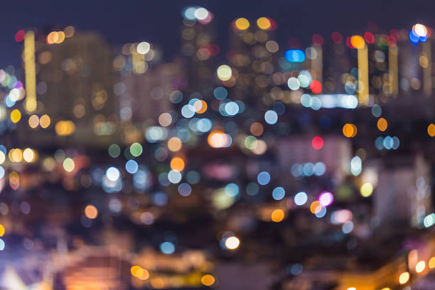 istock Blur image of Bangkok city with circle bokeh 467328110