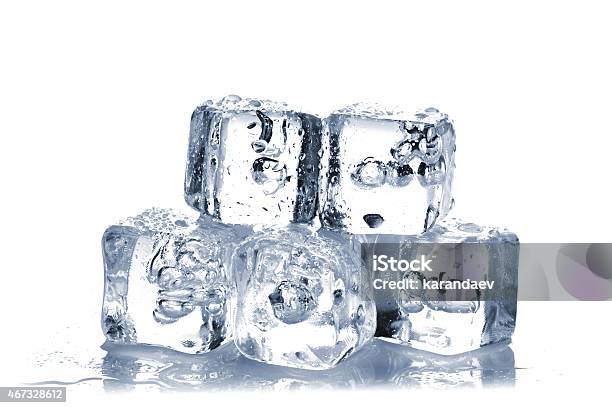 Melting Ice Cubes Stock Photo - Download Image Now - 2015, Block Shape, Blue