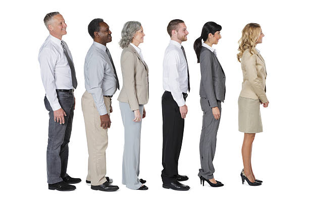 istock Diverse business people in line on studio white background 467331409