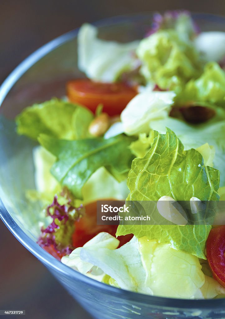 Healthy Salad Close-up shot of a fresh salad in a glass. Natural lighting Cherry Tomato Stock Photo