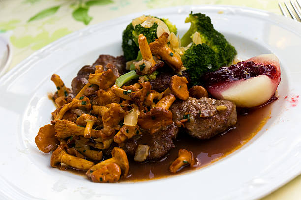 Tenderloin of Roe Deer Back with Chanterelle Tenderloin of Roe Deer Back with Chanterelle. animal back stock pictures, royalty-free photos & images