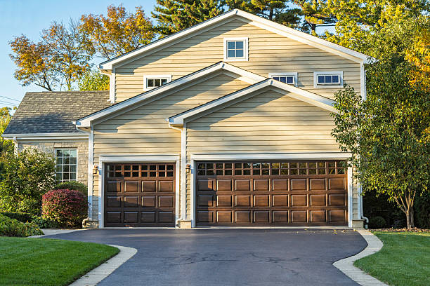 A modest brick home is photographed. Plenty of copy space both above and below the house.