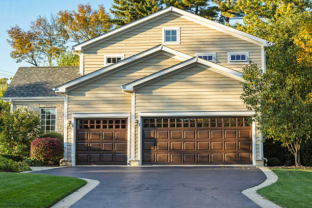 Traditional American home with garage and front garden stock photo