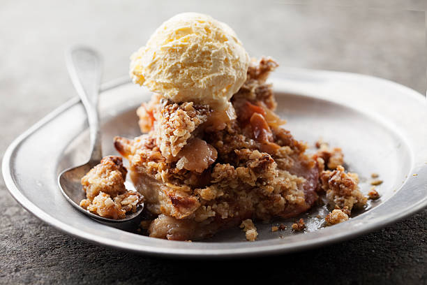 apple crumble apple crumble with vanilla ice cream cobbler dessert stock pictures, royalty-free photos & images
