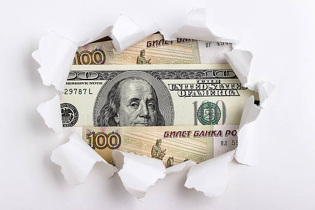 istock Money in the frame of torn paper 467334666