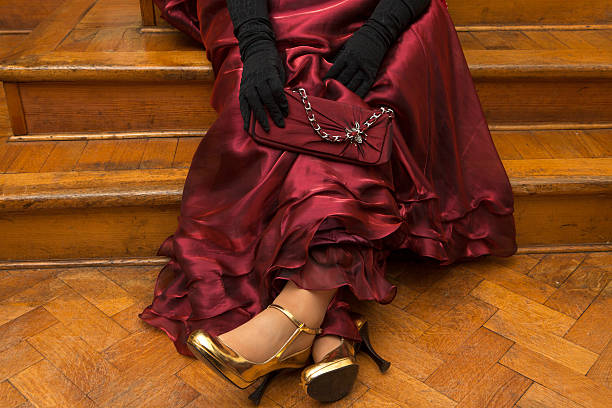 istock Sitting girl in red dress 467336737