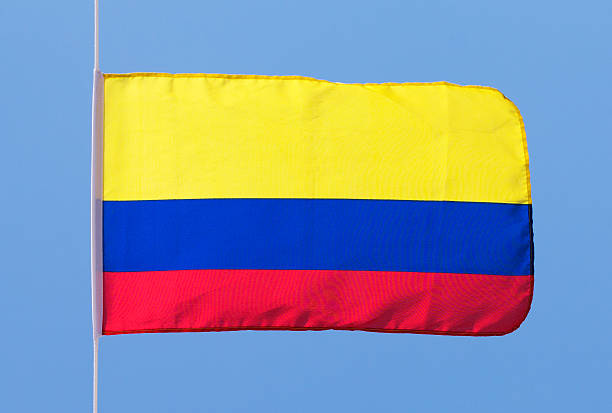 istock Colombian flag in wind against the sky 467338637