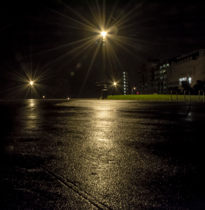 Wet dark night on Plymouth hoe in England