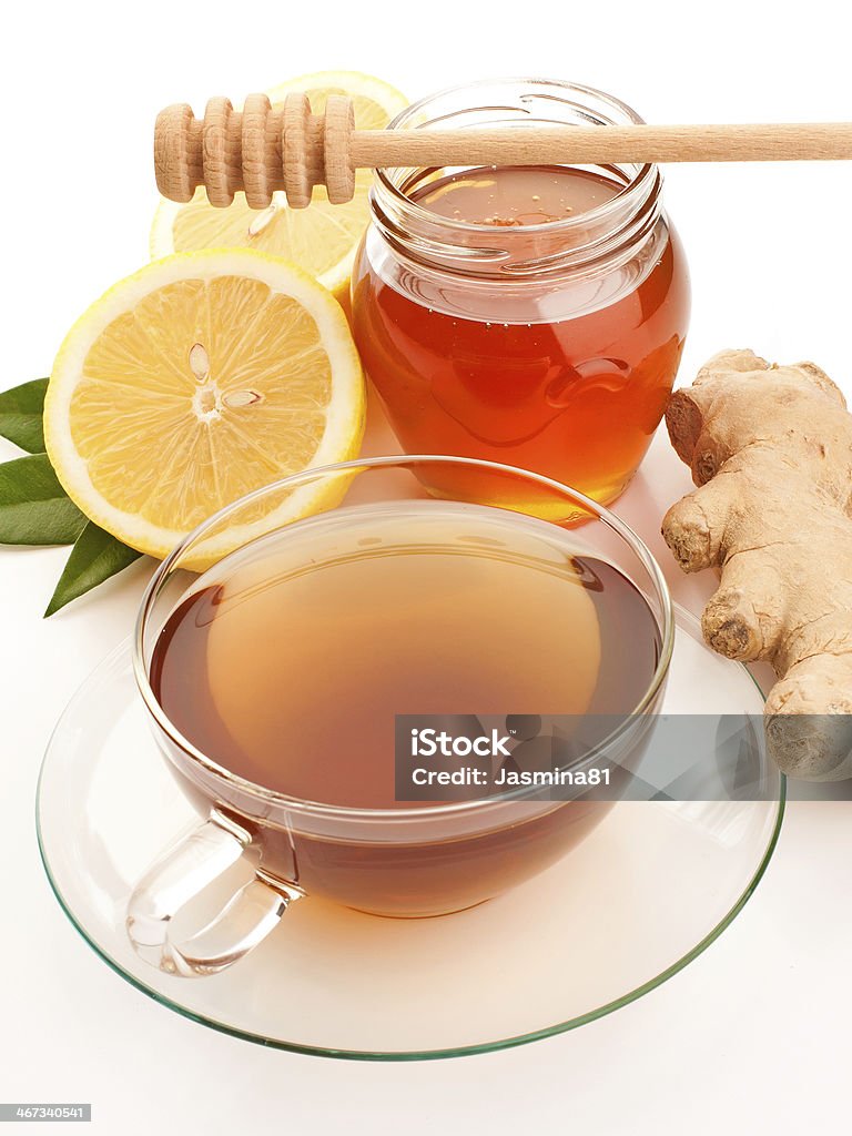Tea with honey, lemon and ginger Tea in glass cup with honey, lemon and ginger Afternoon Tea Stock Photo