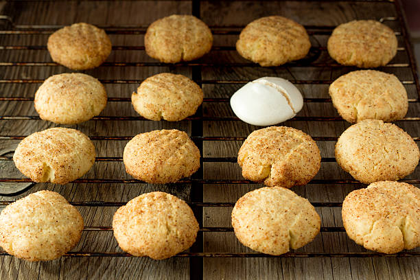 istock Shortbread cookies and meringue on wire rack 467342442