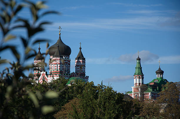 istock Church with black domes against the blue sky 467342780