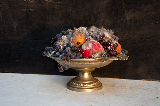 Pear, grape, quince, and other autumn fruits on a rustic  table
