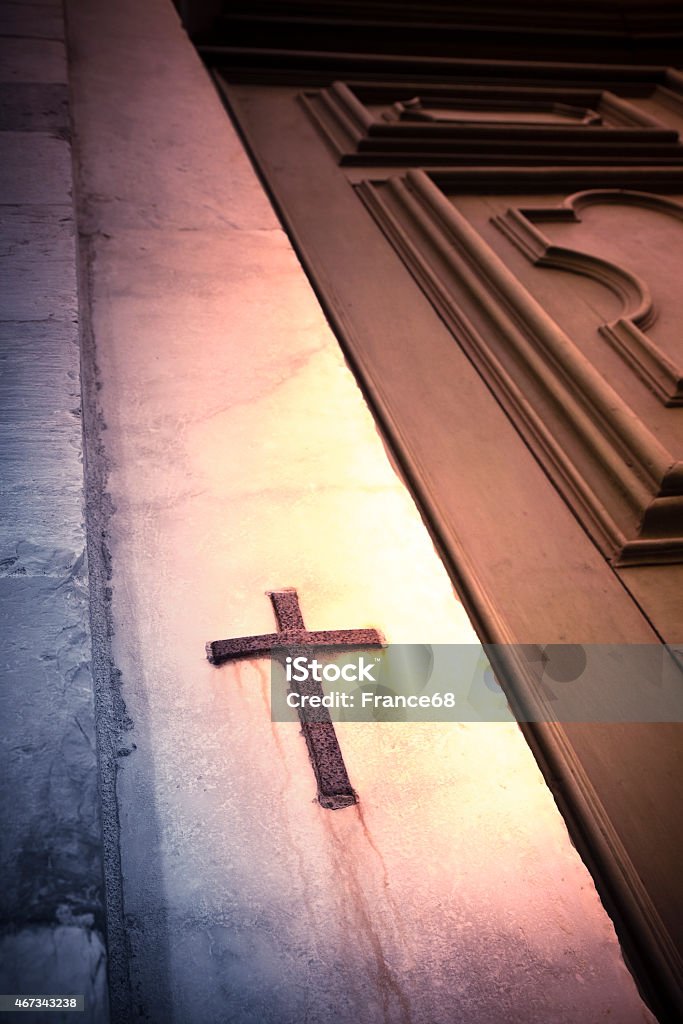 Iron cross snuggled in stone Iron cross snuggled in stone - concept image 2015 Stock Photo