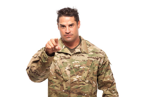 istock Army soldier pointing at camera 467343260