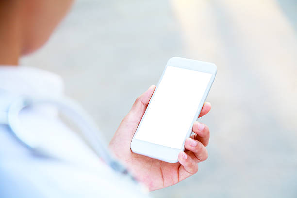 istock Doctor hand holding blank screen smart phone 467346188