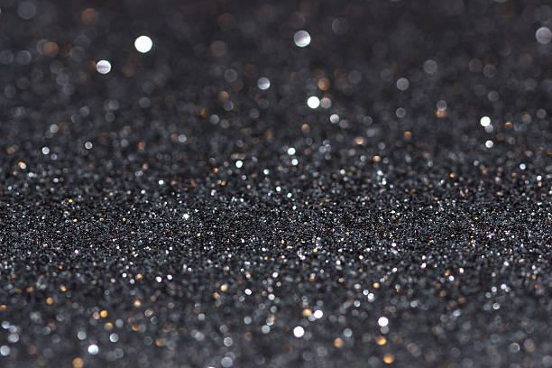 Black glitter texture background Defocused lights background.bright silver glitter black yellow christmas background paper texture, macro shots under studio lights greeting card white decoration glitter stock pictures, royalty-free photos & images