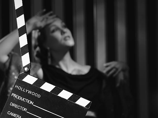 istock Hollywood woman and clapboard 467352166