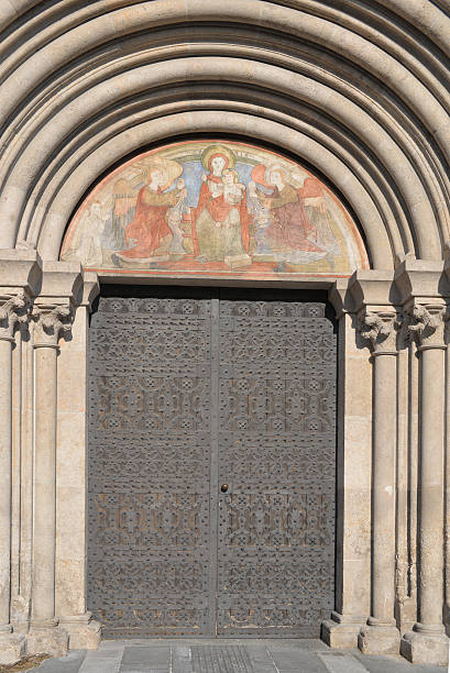 Romanic Gate (The Bridal Gate) The bridal gate, an arched portal on the South side of the Cathedral of Wiener Neustadt. The delicate Romanesque carving is reminiscent of the art of the Normans.  wiener neustadt stock pictures, royalty-free photos & images