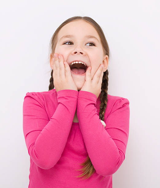 istock Little girl is holding her face 467360969