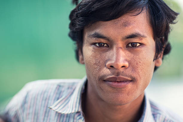 Portrait of a young cambodian man Closeup portrait of a young cambodian (20+) man. cambodian ethnicity stock pictures, royalty-free photos & images