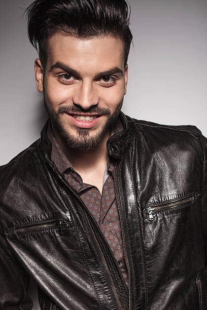 istock attractive casual man smiling for the camera 467366608