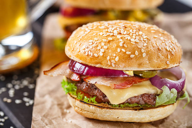 istock Delicious burger on wooden board 467366970