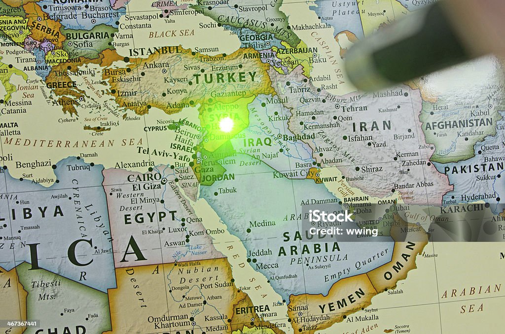 World Hot Spots ... Syria A map of a troubled country with a green laser pointer showing Syria. The map is by RoundtheWorld Productions. Laser Pointer Stock Photo