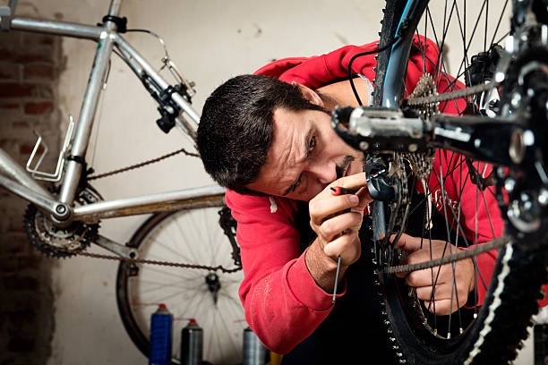istock Bike Mechanic At Work In a Workshop 467372299