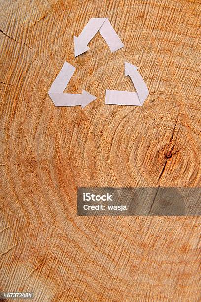 Closeup Wooden Cut And Recycle Symbol Stock Photo - Download Image Now - 2015, Aging Process, Arrow Symbol