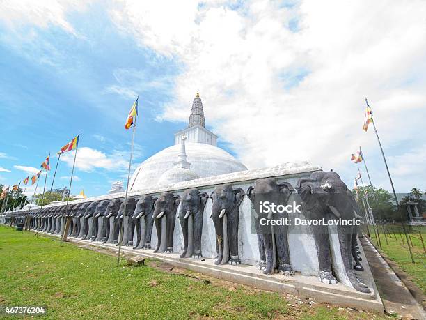 Elephants As Fence Surrounding Ruwanwelisaya Stupa In Anuradhapura Stock Photo - Download Image Now